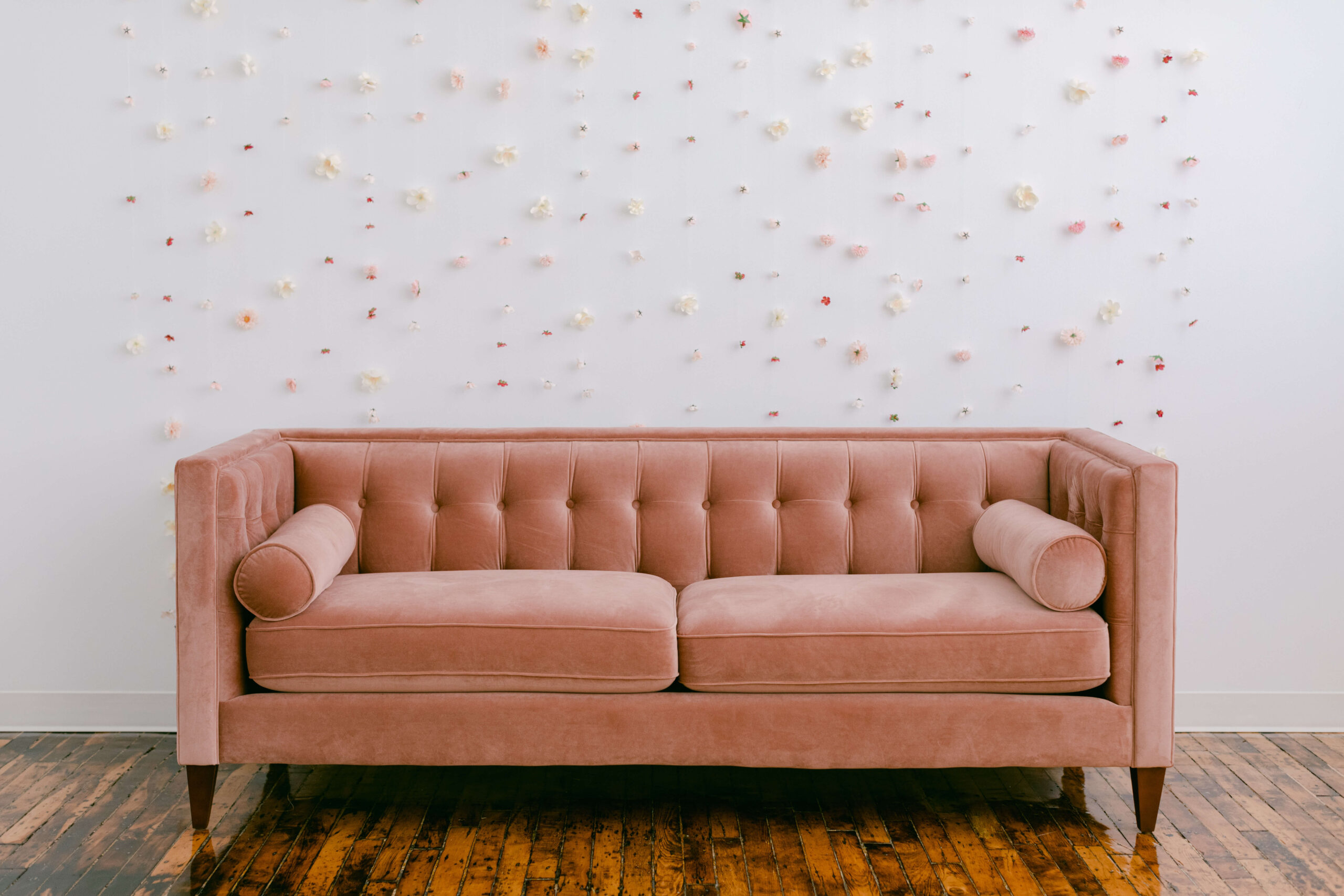 Rose colored couch will be able to rent fro Rent Pearl